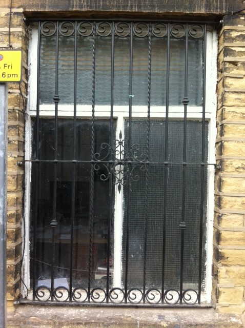 Wrought iron window grille rings